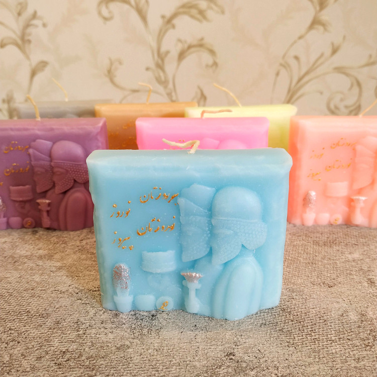 شمع دستساز با نقش کتیبه ای برای سفره هفت سین