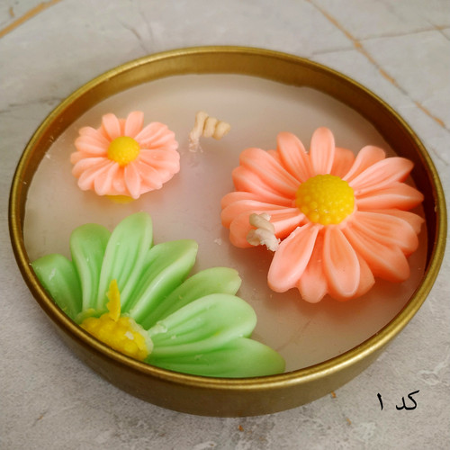 وارمز فلزی و شمع گل بابونه تزئینی