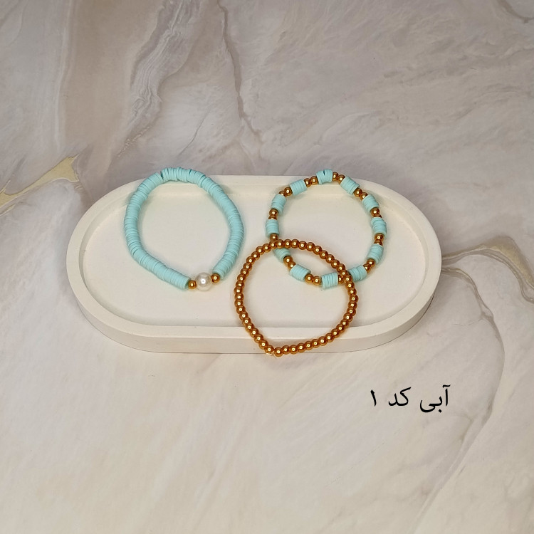 دستبند سه تایی فیمو واشری و مروارید آبی با مهره های طلایی