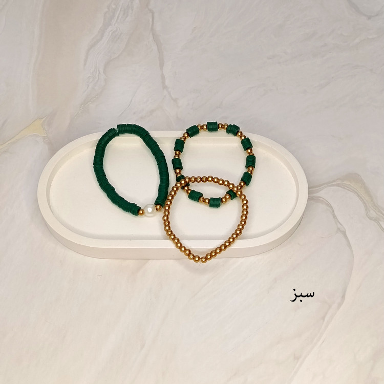 دستبند سه تایی فیمو واشری و مروارید سبز رنگ با مهره های طلایی
