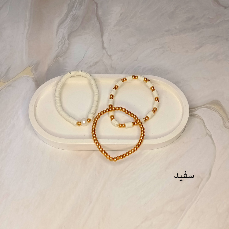 دستبند سه تایی فیمو واشری و مروارید سفید با مهره های طلایی