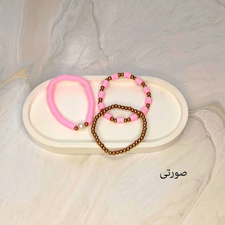 دستبند سه تایی فیمو واشری و مروارید صورتی رنگ با مهره های طلایی